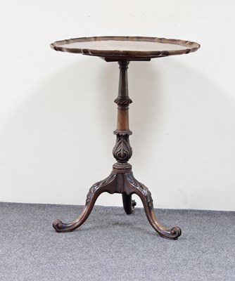 Lot 719 - A George III style mahogany tripod table with...