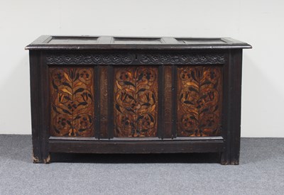 Lot 722 - An 18th Century oak chest, the hinged triple...