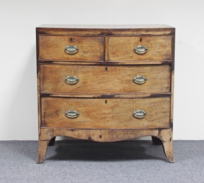 Lot 724 - A 19th Century bowfront chest of two short...