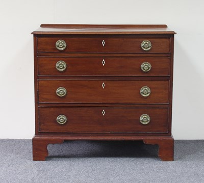 Lot 735 - A George III mahogany chest of four long...