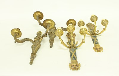 Lot 744 - Two pairs of gilt metal two-light wall lights