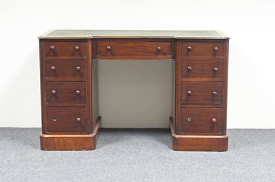 Lot 754 - A Victorian mahogany breakfront desk, fitted...