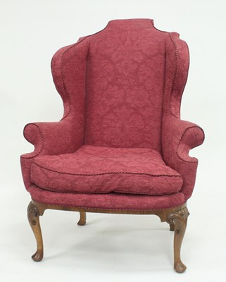 Lot 785 - An 18th Century style walnut wing armchair,...