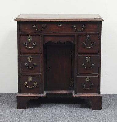 Lot 808 - An 18th Century mahogany kneehole desk, 75cm wide