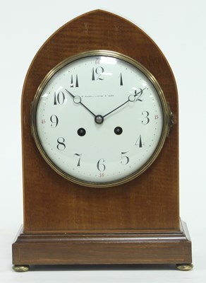 Lot 828 - An Edwardian arch top mantel clock with...