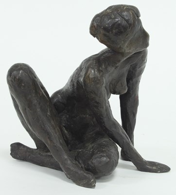 Lot 862 - A 20th Century bronze figure of a seated nude,...