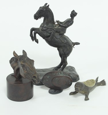 Lot 866 - A bronze figure depicting a rider of the...