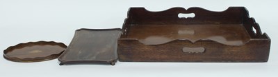 Lot 905 - A mahogany tray with pierced carry handles to...