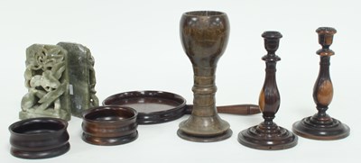 Lot 909 - A pair of turned wood candlesticks, 23cm high,...