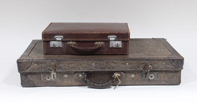 Lot 959 - A simulated crocodile skin suitcase, leather...