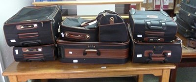 Lot 962 - A T. Anthony Ltd suitcase with leather trim...