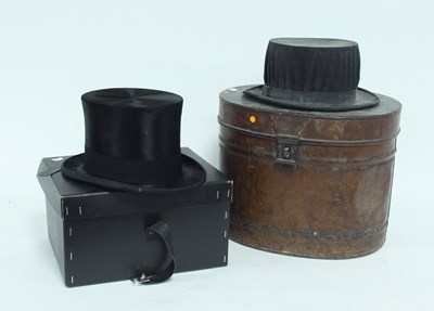 Lot 963 - A brushed silk top hat by Lock and Co, boxed,...