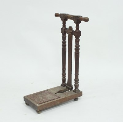 Lot 44 - An Victorian oak boot jack, 82cm high