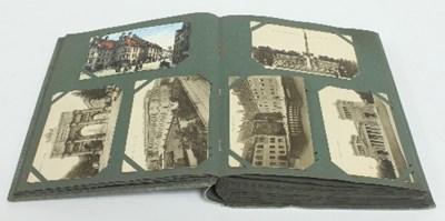 Lot 67 - An early 20th Century postcard album, mainly...