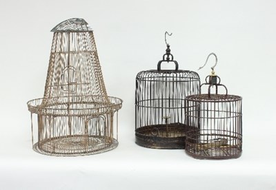 Lot 70 - A wirework birdcage of circular tapering form,...