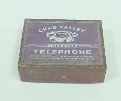 Lot 76 - A Chad Valley 'Improved Telephone' with box...