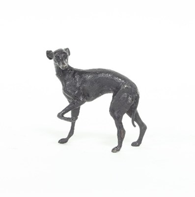 Lot 88 - A cast metal figure of a whippet, after P J...