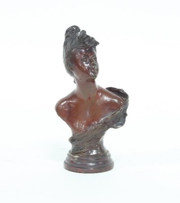 Lot 89 - A patinated bronze bust of a lady, signed H...