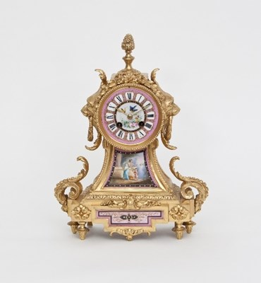 Lot 99 - An ormolu and porcelain eight day mantel clock,...