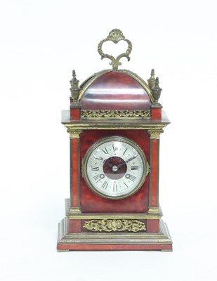 Lot 105 - A tortoiseshell mantel clock, of 18th Century...