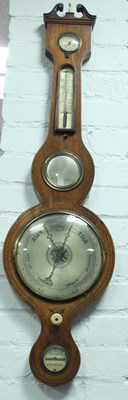 Lot 106 - A Regency rosewood barometer and thermometer...