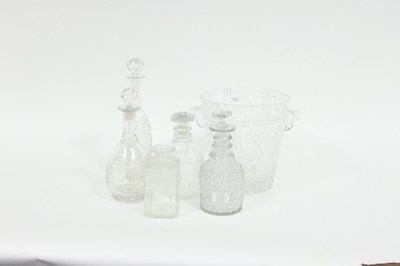 Lot 115 - Five cut glass decanters, with four stoppers...