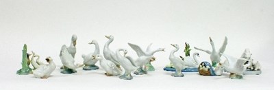 Lot 123 - A collection of six Nao ceramic geese, some...