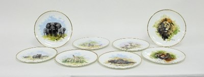 Lot 127 - A collection of eight ceramic plates designed...