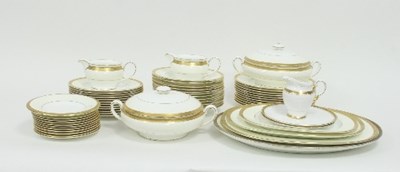 Lot 134 - A Minton part dinner service, white with gold...