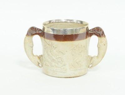 Lot 181 - A 19th Century stoneware loving cup with...