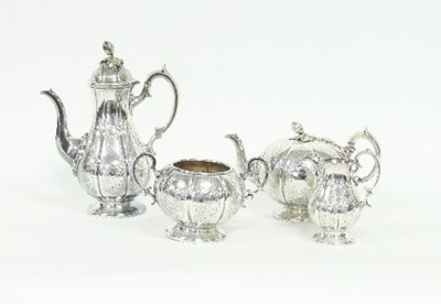 Lot 186 - A four-piece silver plated tea and coffee...