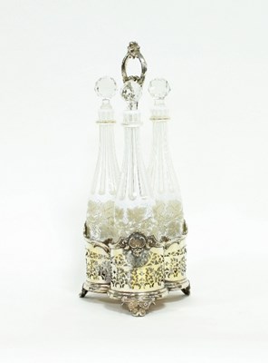 Lot 190 - A mid Victorian silver plated decanter stand...