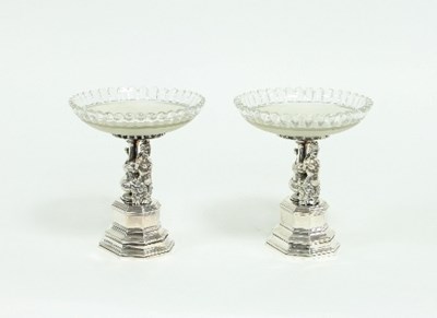 Lot 201 - A pair of white metal and cut glass mounted...