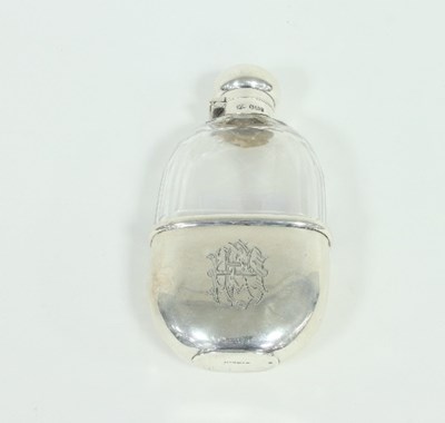 Lot 254 - A silver mounted glass spirit flask, the...