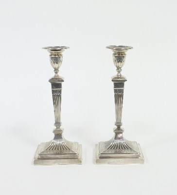 Lot 260 - A pair of Victorian silver candlesticks,...