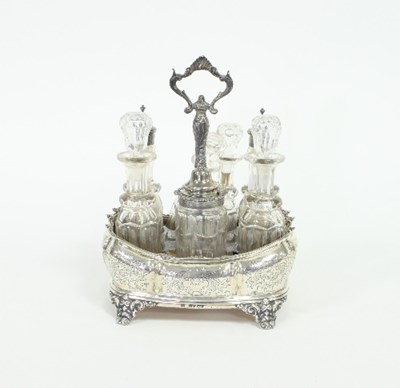 Lot 280 - A Victorian silver cruet stand, J E, London...