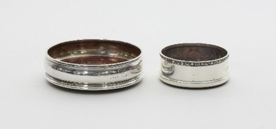 Lot 323 - A silver wine coaster, H B & H, London 2000,...