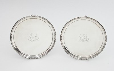 Lot 336 - A pair of George III silver waiters, John...