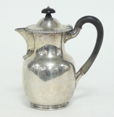 Lot 338 - A silver hot water jug, Sheffield 1908, fitted...