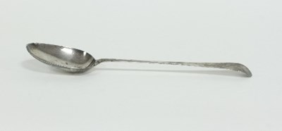 Lot 344 - A George III shell back silver basting spoon,...