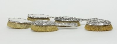 Lot 364 - A pair of silver backed hair brushes, Henry...