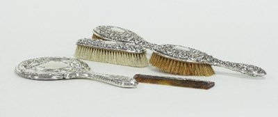 Lot 365 - A pair of silver backed hair brushes, W...