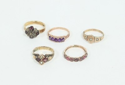 Lot 397 - Five gem set dress rings including a...