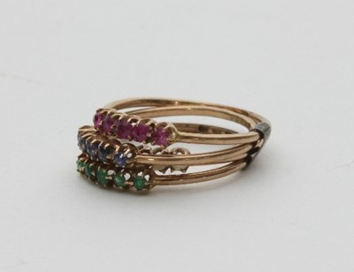 Lot 406 - Four five-stone gem set rings