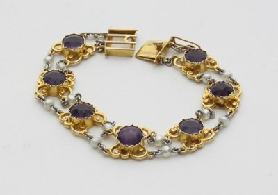 Lot 427 - A 15ct gold, amethyst, and seed pearl bracelet,...