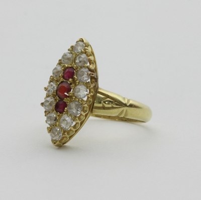 Lot 444 - A ruby and diamond ring of navette shape, set...