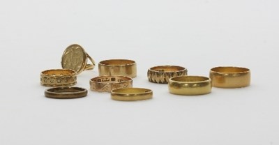 Lot 446 - Three 22ct gold wedding bands, approximately 3....