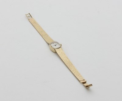 Lot 465 - A lady's 9ct gold cased wristwatch, the oblong...