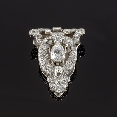 Lot 470 - An Art Deco diamond clip, the central pear...