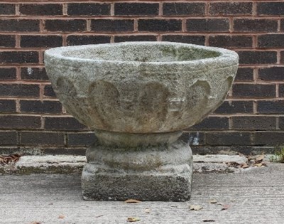 Lot 501 - An Irish reconstituted stone bird bath with...